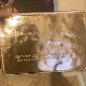 Brand new bebe rose gold wristlet